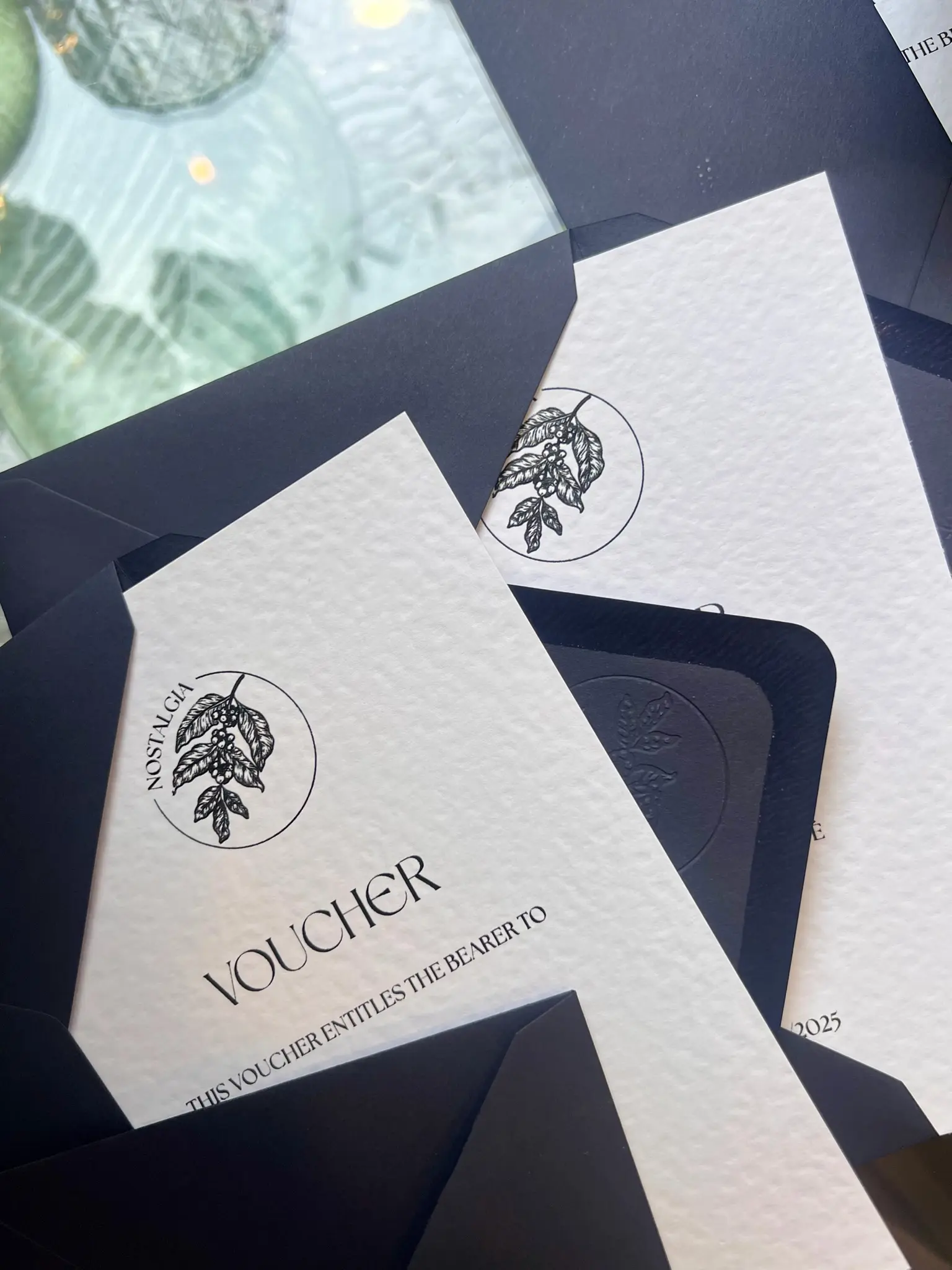 Nostalgia gift voucher cards with branded black envelopes